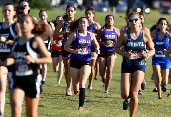 MGA women's cross country runners in competition.